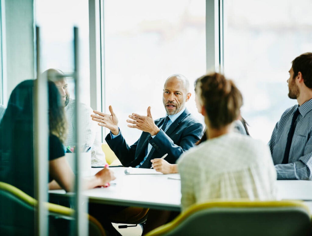 People working in a conference room.